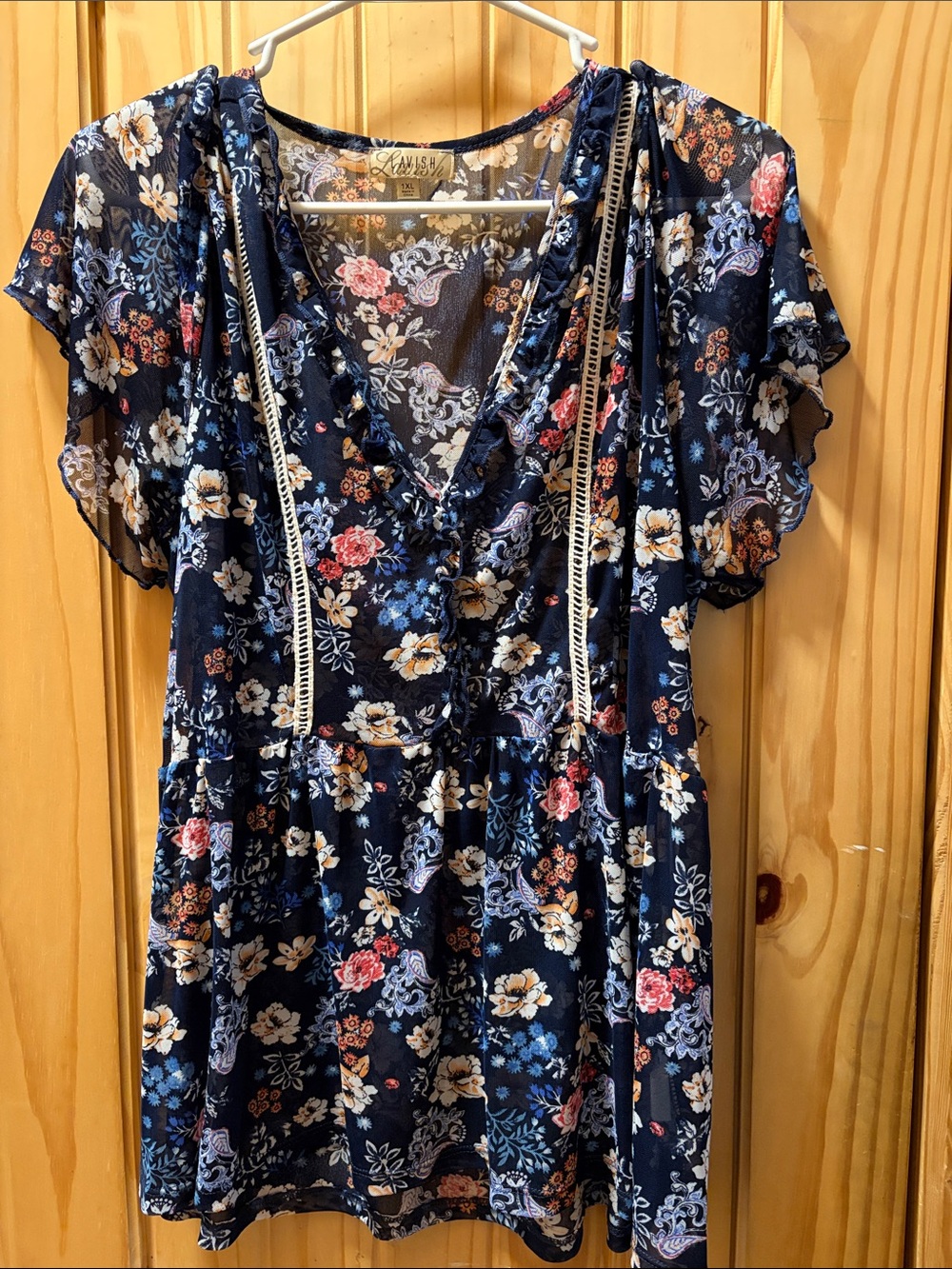 Lavish Navy Floral V-Neck Peplum Top